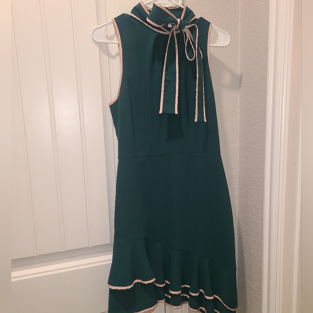 Sleeveless midi dress by Amanda Uprichard.  Green trimmed with champagne/pink